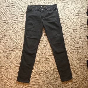Grey mid rise 711 Levi skinny jeans